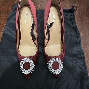 BRAND NEW, red satin pumps.